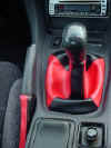 Red and black shift boot with ebrake cover