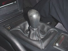Black shift boot with blue stitching