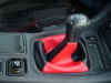 Red and black shift boot